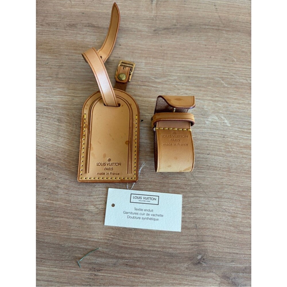 Authentic Louis Vuitton id tag and strap